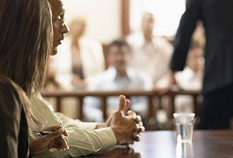Legal Aid Courtroom scene with attorneys and jury